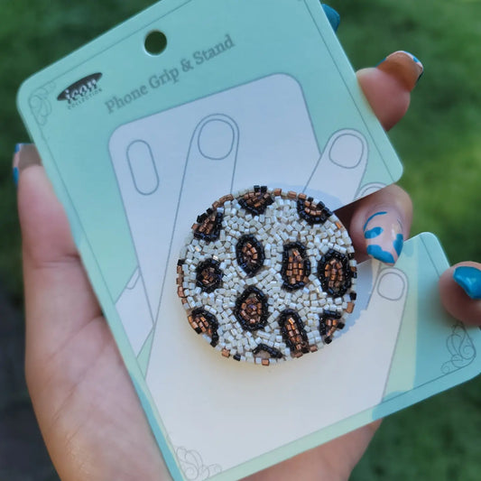 Leopard beaded phone grip.