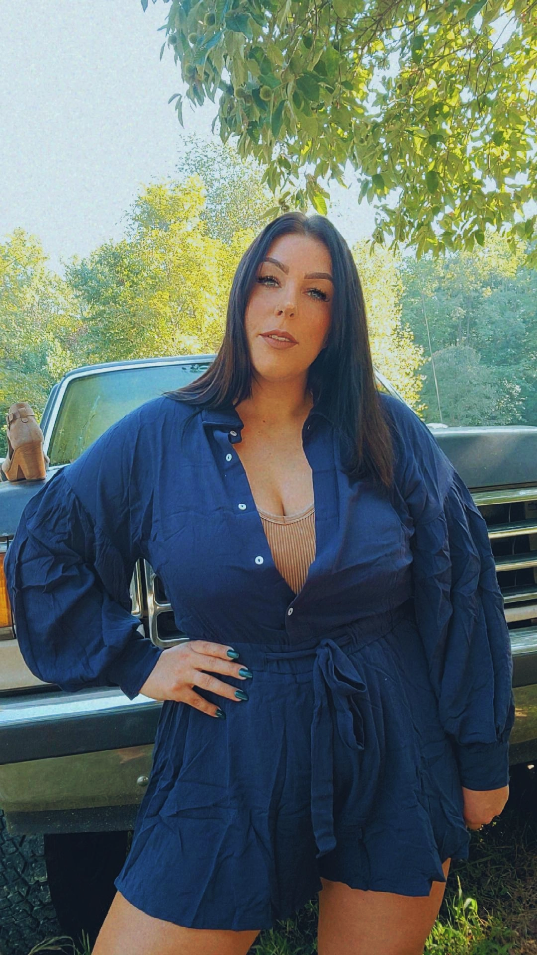 Navy Solid belted romper collared button down closure long cuffed sleeves.