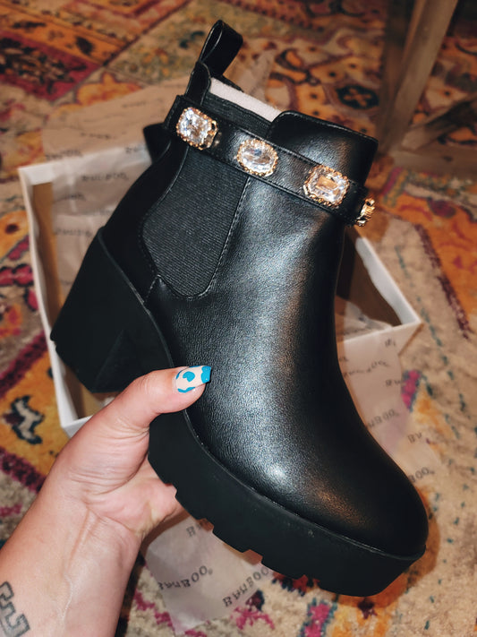 She's Designer Bootie